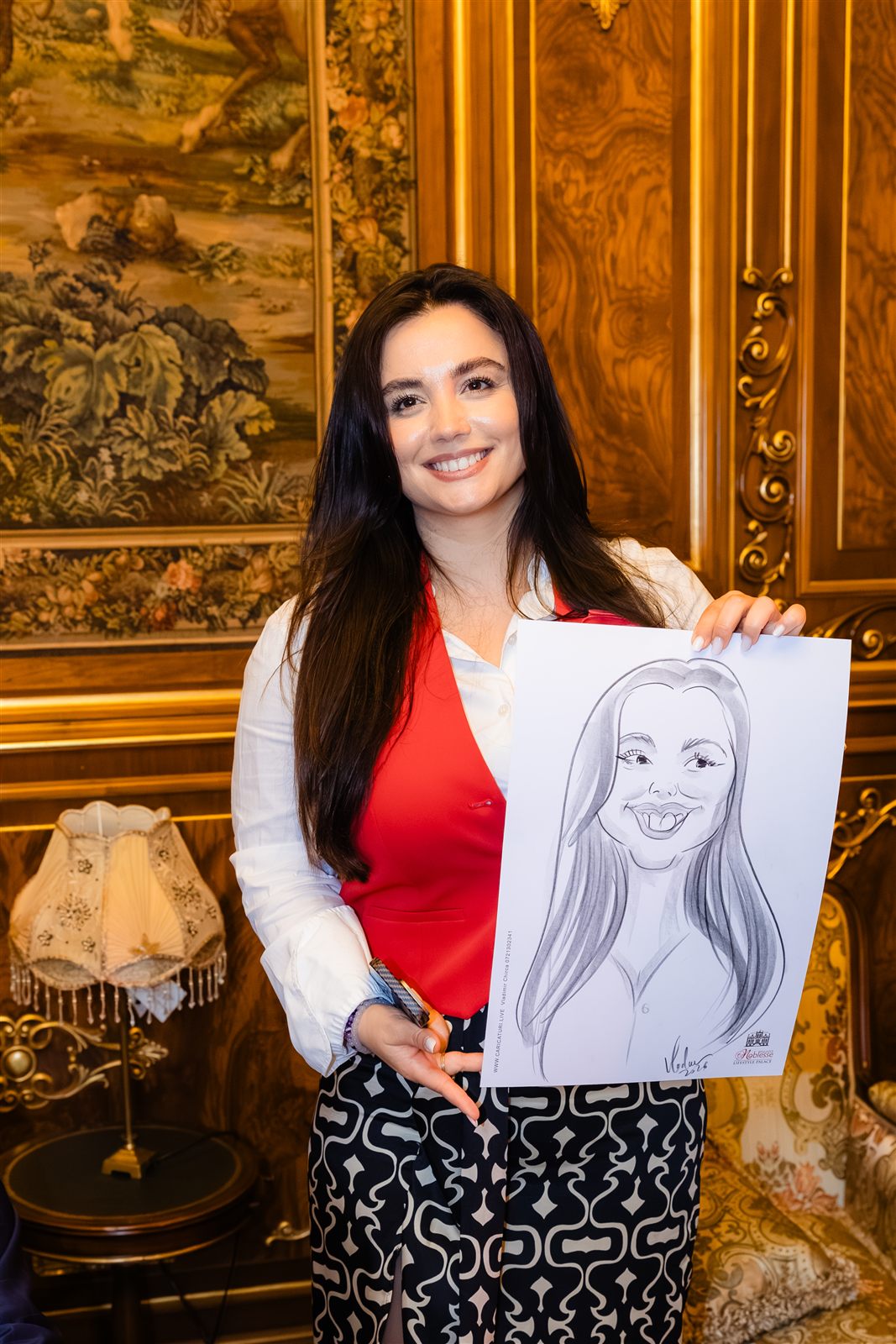 Invitată cu caricatura ca amintire de la eveniment — Palatul Noblesse